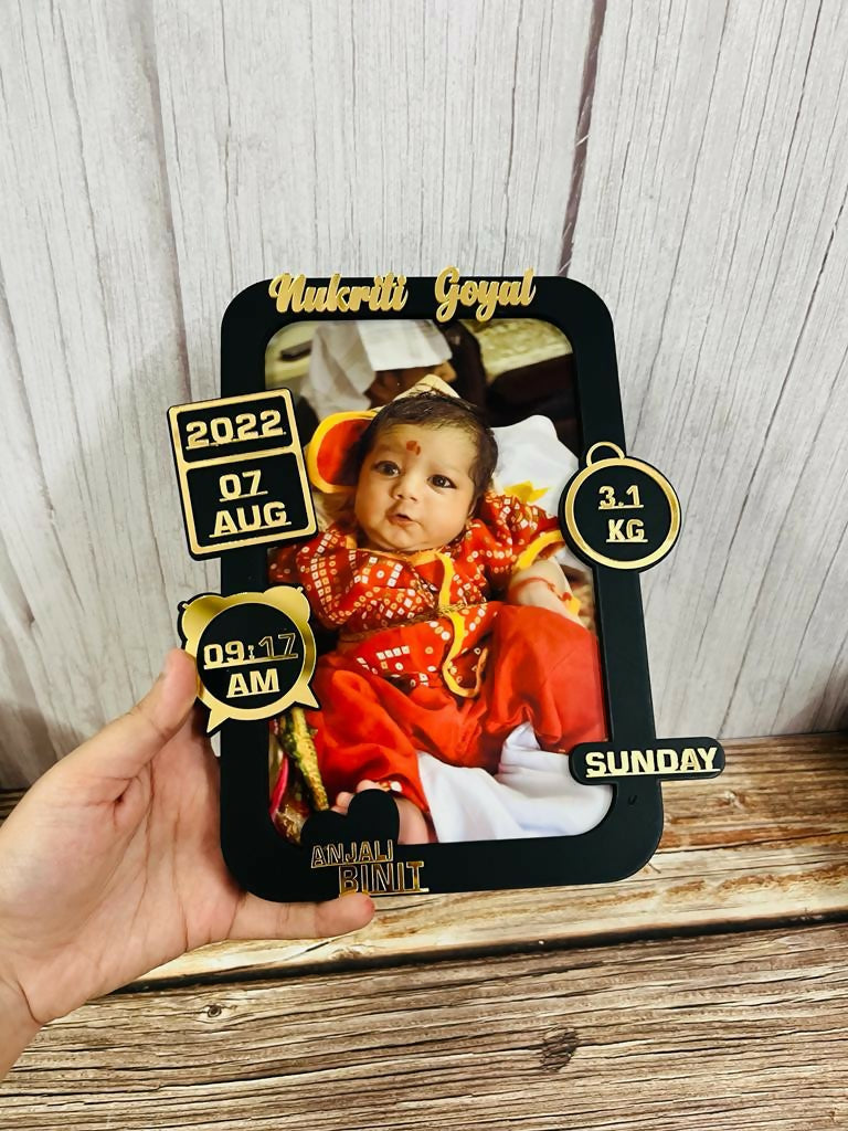 Baby photo frame with personalized details