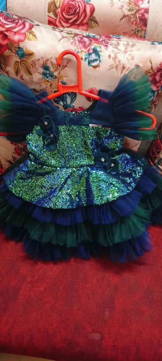 Elevate your baby girl's wardrobe with our Designer Frock/Dress, offering elegance and style for special occasions.