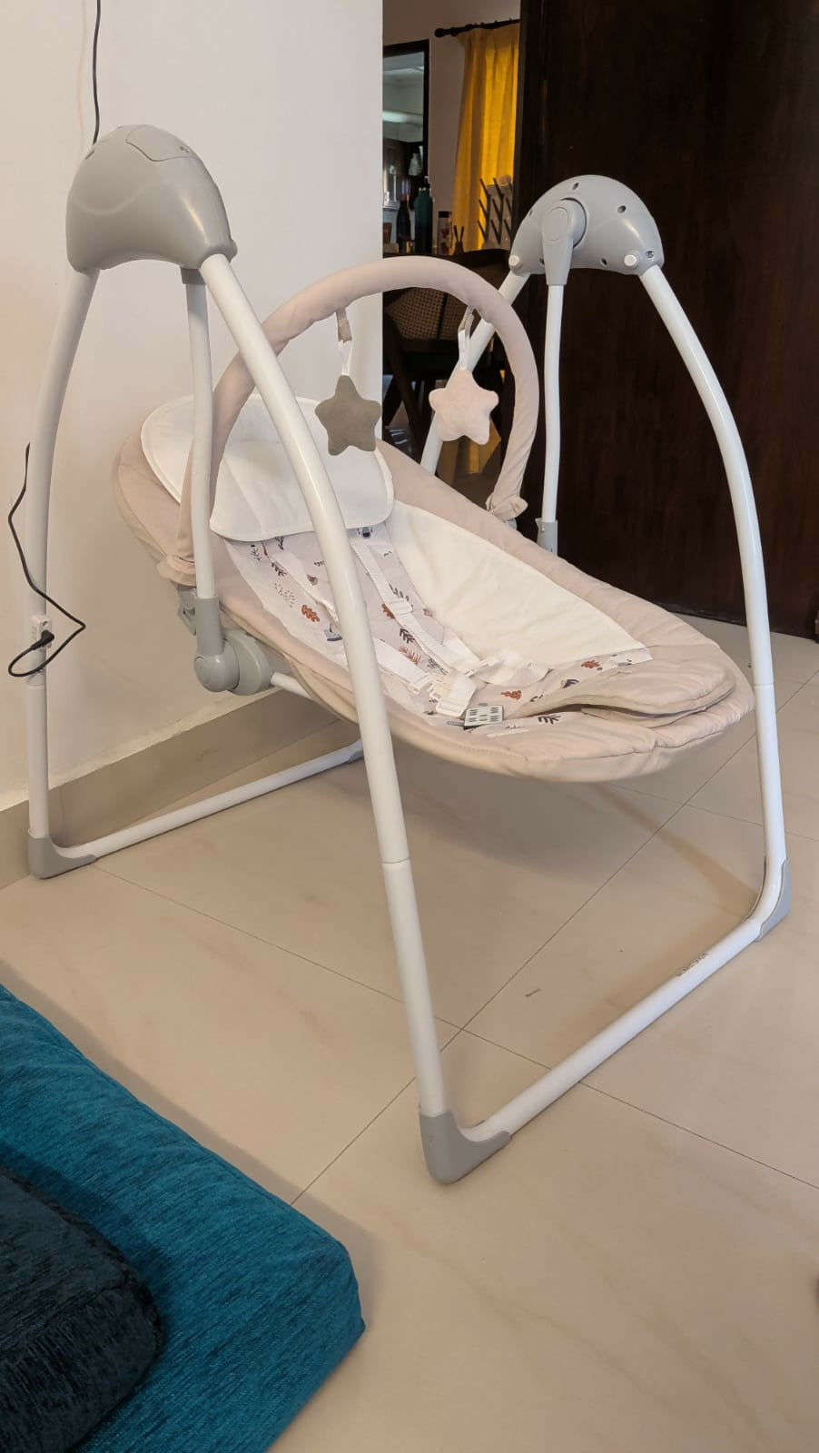 R for Rabbit automatic electric swing with gentle rocking motion, cushioned seat, secure safety harness, soothing comfort, and relaxing support for babies.