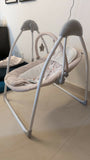 R for Rabbit automatic electric swing with gentle rocking motion, cushioned seat, secure safety harness, soothing comfort, and relaxing support for babies.