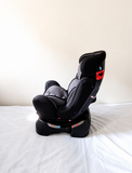 R for Rabbit Jack N Jill convertible car seat with rear and forward-facing modes, adjustable safety harness, cushioned seating, side protection, and support for children from 0–25 kg.