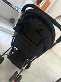 BABYHUG Cocoon stroller/pram with a reclining seat, foldable design, adjustable canopy, 5-point safety harness, smooth wheels, and storage basket for comfortable travel with babies and toddlers.