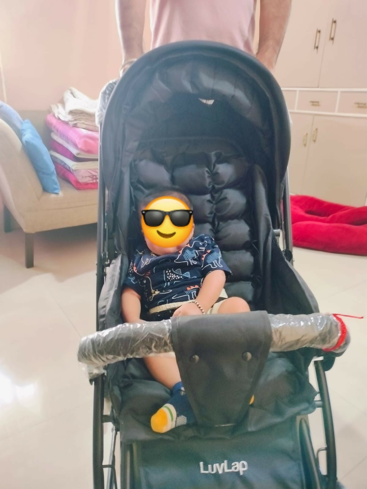 LUVLAP Starshine pram stroller with reclining seat, smooth wheels, safety harness, adjustable canopy, and comfortable travel design for babies and toddlers.