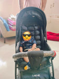LUVLAP Starshine pram stroller with reclining seat, smooth wheels, safety harness, adjustable canopy, and comfortable travel design for babies and toddlers.