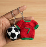 Football and jersey combo keychain featuring a miniature football, personalized jersey charm, durable key ring, and stylish design for sports lovers, gifting, and everyday use.