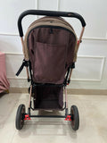 StarAndDaisy foldable baby stroller travel pram with reclining seat, sturdy wheels, safety harness, adjustable canopy, and compact foldable design for comfortable baby travel.