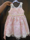 Adorn your baby girl in this elegant Pearl and Lace Work Frock, perfect for making precious memories!