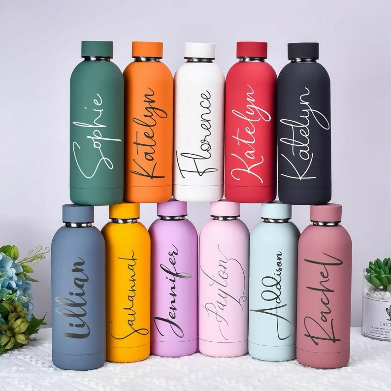 Colorful water bottles with personalized names