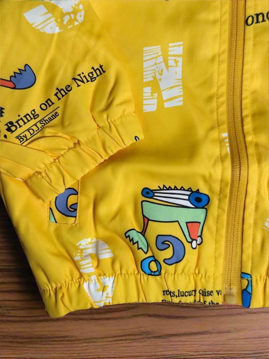 Yellow jacket with cartoon designs and text