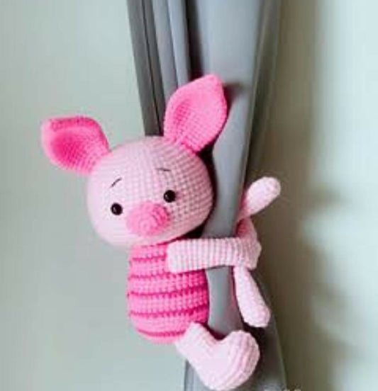 Adorable and functional curtain holders for baby rooms, designed to keep curtains neatly tied while adding a playful touch to nursery decor.