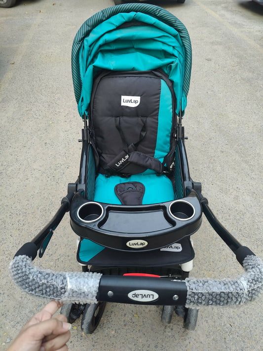 Enjoy stress-free outings with your baby with the LUVLAP Galaxy Stroller/Pram, featuring a comfortable seat, adjustable canopy, and convenient one-hand fold mechanism for easy storage and transport.