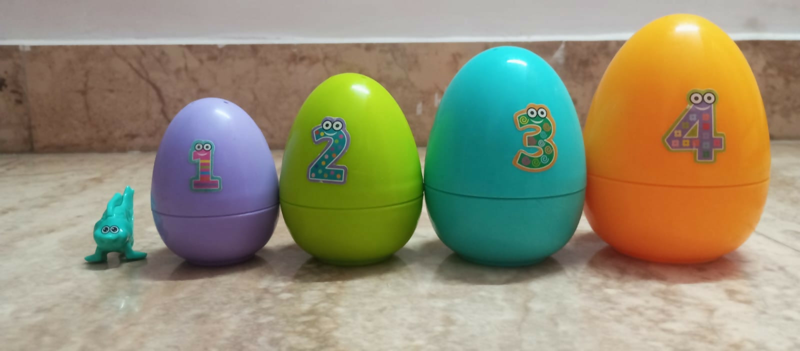 LITTLES pack of 8 baby toys – nesting eggs, stacking rings, rattles & more for fun learning.
