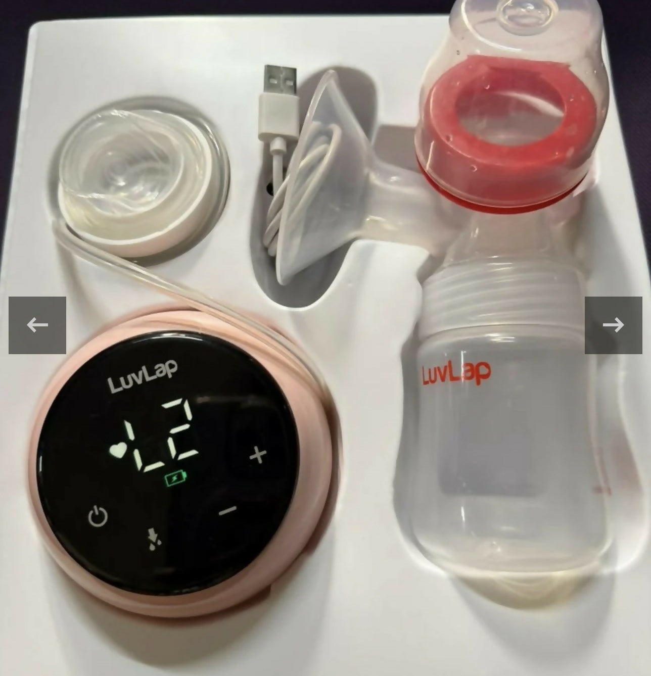 LuvLap breast pump set with bottle and control panel on a white background