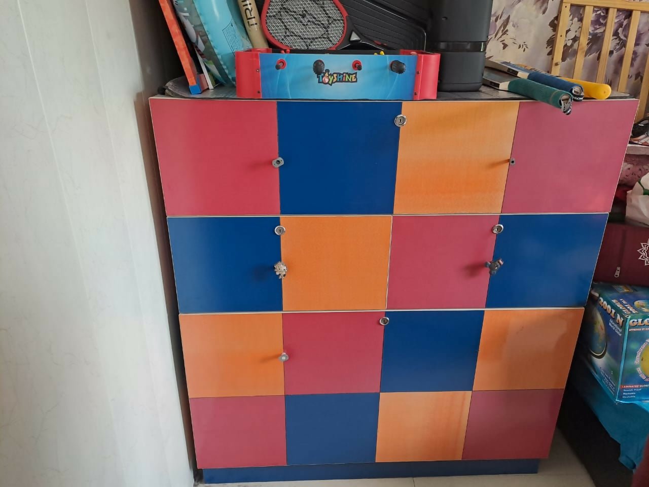 Kids Wardrobe with spacious shelves, hanging section, durable construction, child-friendly design, and ample storage for clothes, toys, books, and everyday essentials.