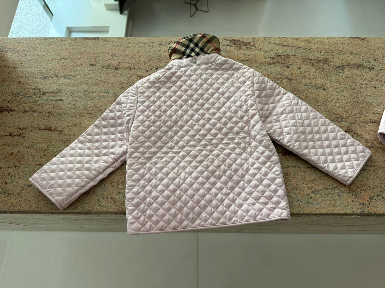 Dress your little fashionista in luxury with the Stylish Burberry Jacket with Detachable Hood - iconic style for every precious moment!