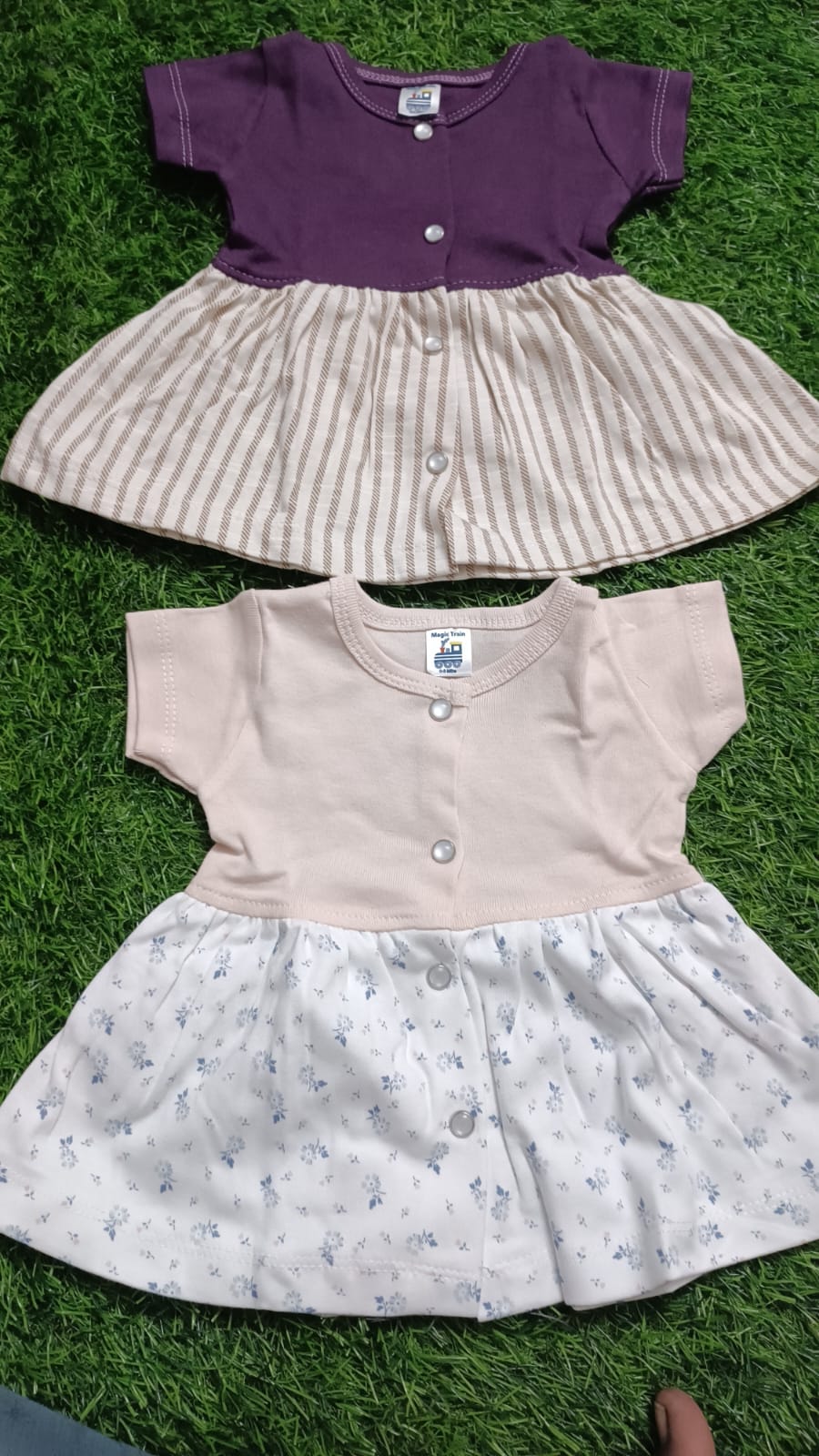 Set of 2 Baby Girl Frocks/Dresses, crafted from soft, breathable fabric with charming designs for comfort and style on any occasion.