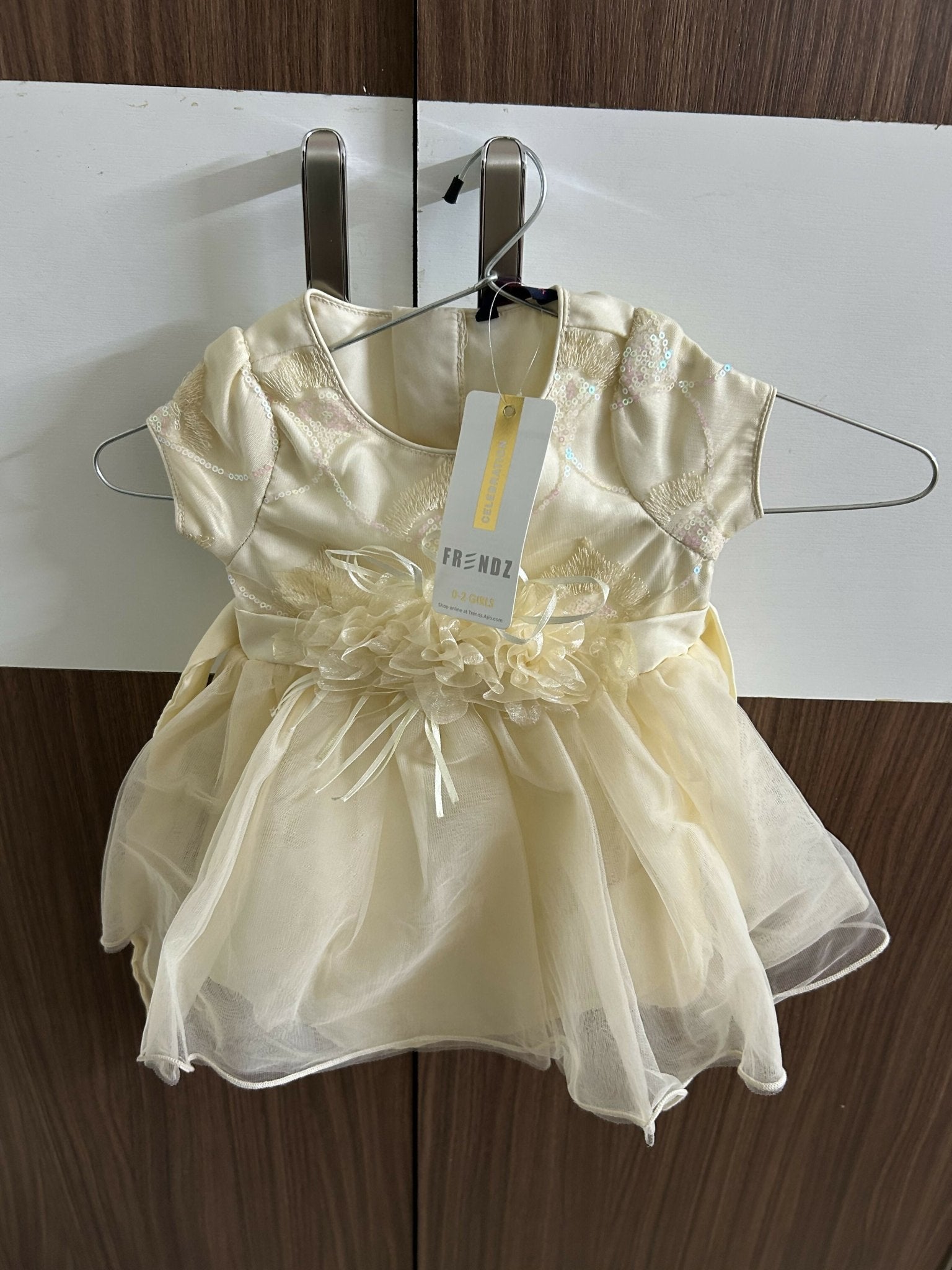 Yellow dress with a tag