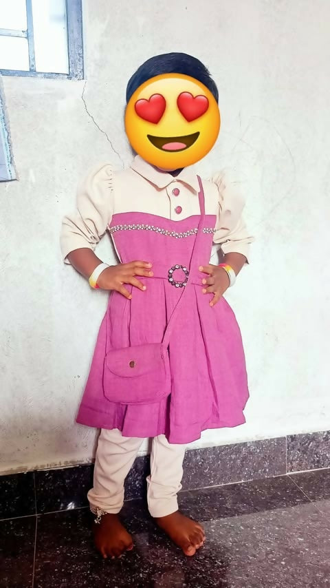 Cotton frock with puff sleeves – soft, breathable, and stylish for kids.