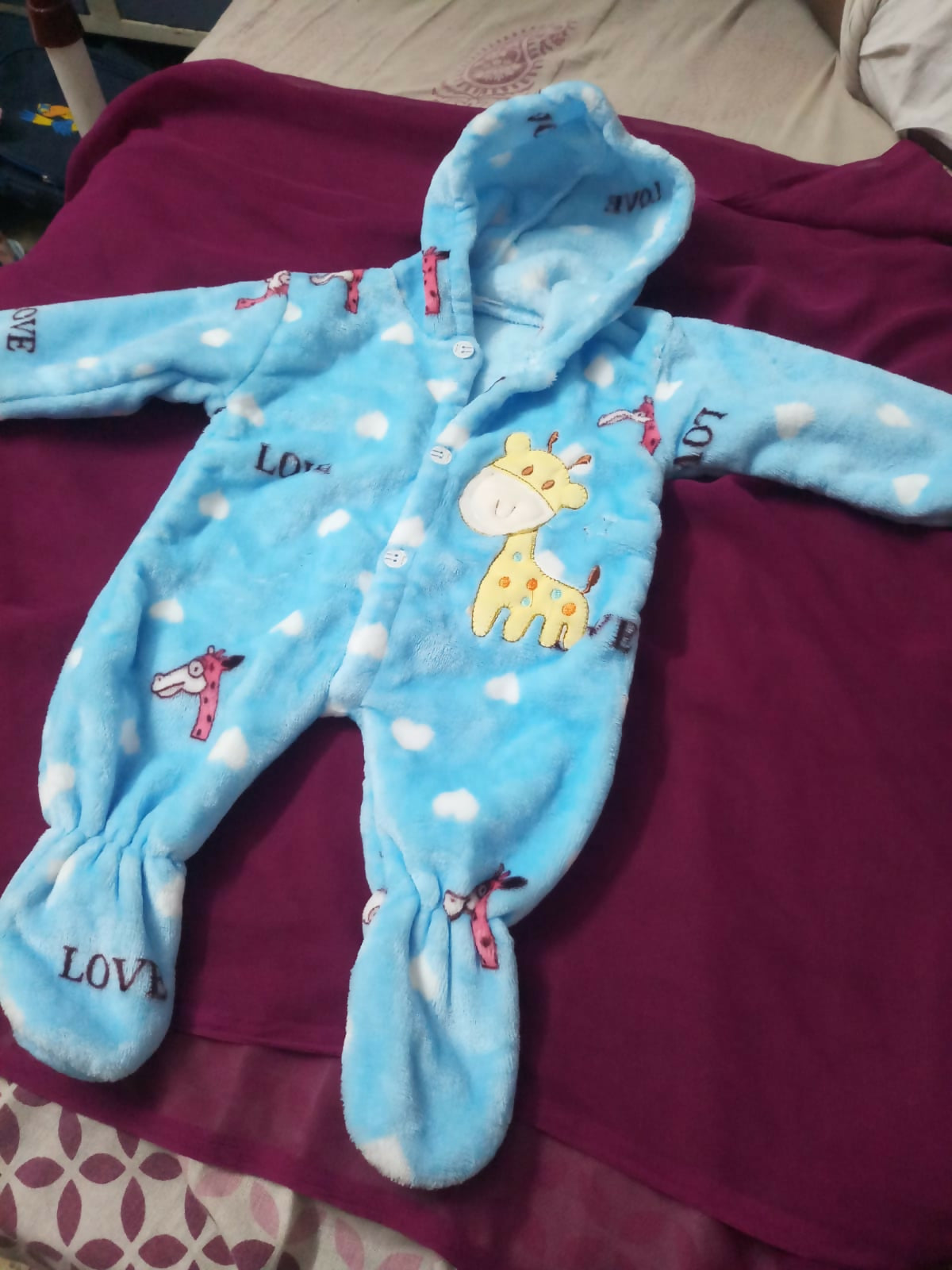 Buy Newborn Baby Clothing Combo – 9-piece set with cotton suits, velvet jumpsuit, woolen shawl & more for cozy all-season comfort.