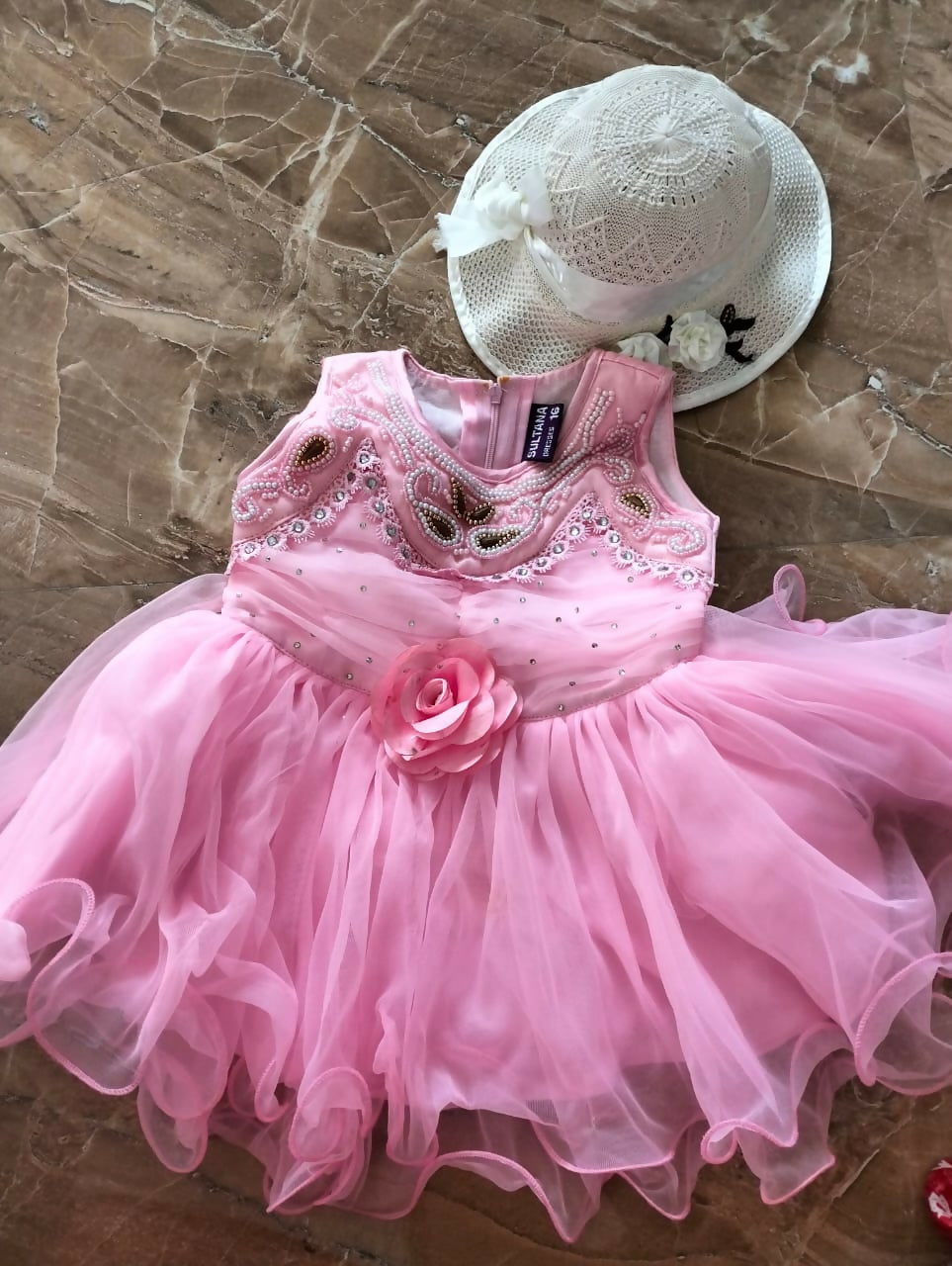 Dress your little princess in style with our collection of Baby Girl Beautiful Dresses/Frocks - where charm meets comfort for every precious moment.