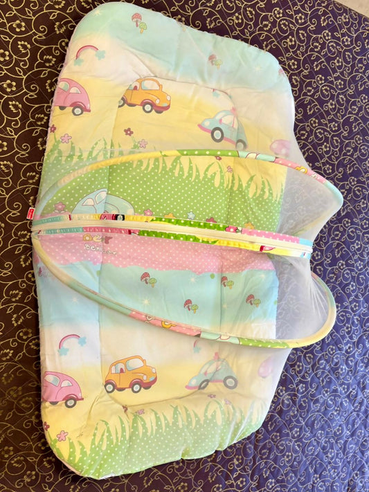 BABYHUG baby bed with mosquito net – safe, soft, and travel-friendly.