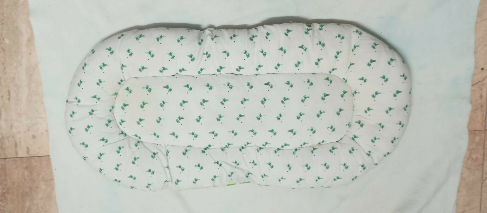 Soft and portable baby bed for newborns – perfect for home or travel.