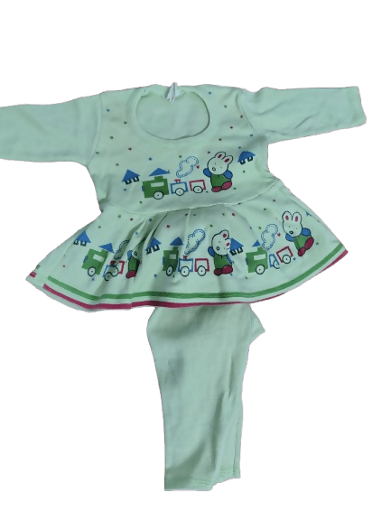 Children's outfit with a green top and pants featuring train designs on a white background