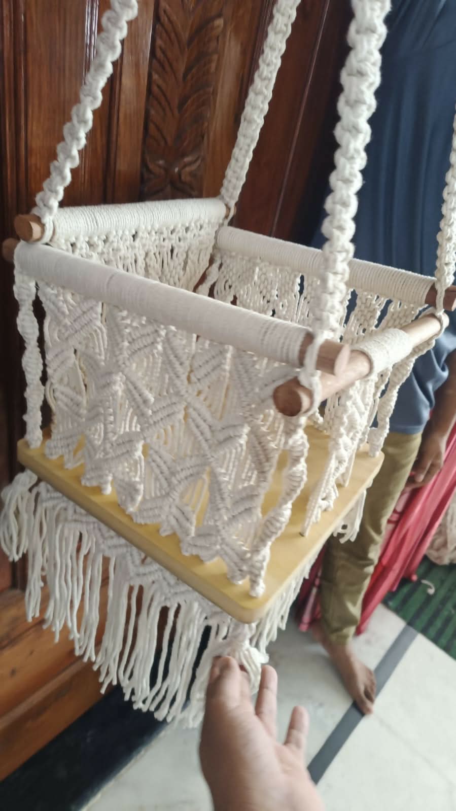 Handcrafted macrame baby swing – safe, stylish, and comfortable for little ones.