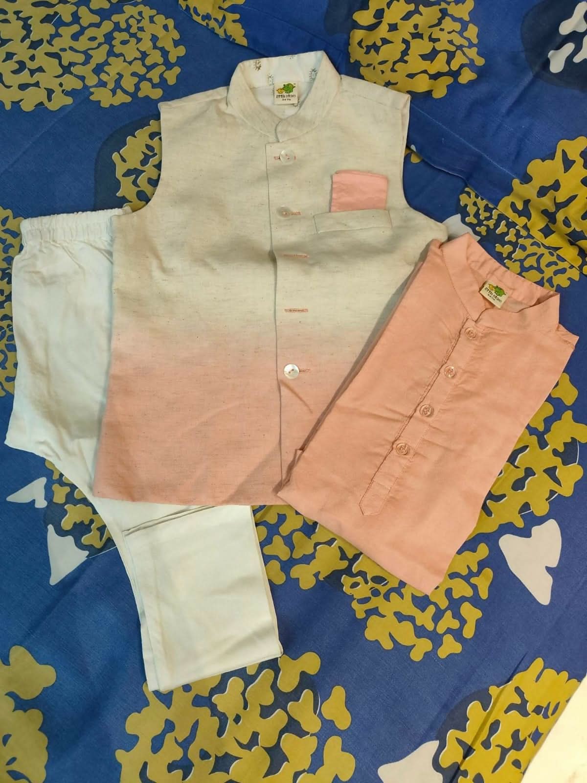 Celebrate special moments with the LITTLE STARS Kurta Pajama and Jacket set, offering style, comfort, and traditional charm for your baby!