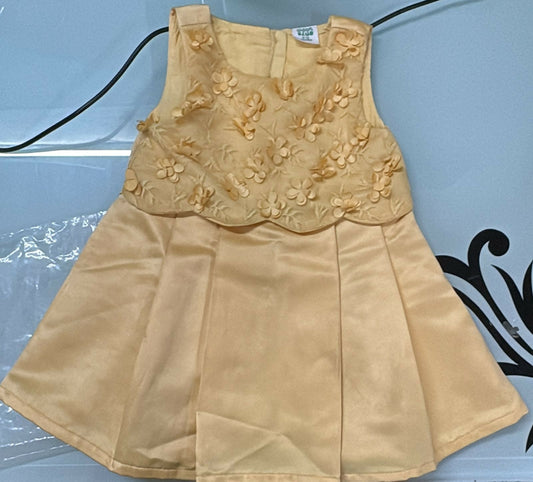 Beige dress with floral embroidery on a blue background