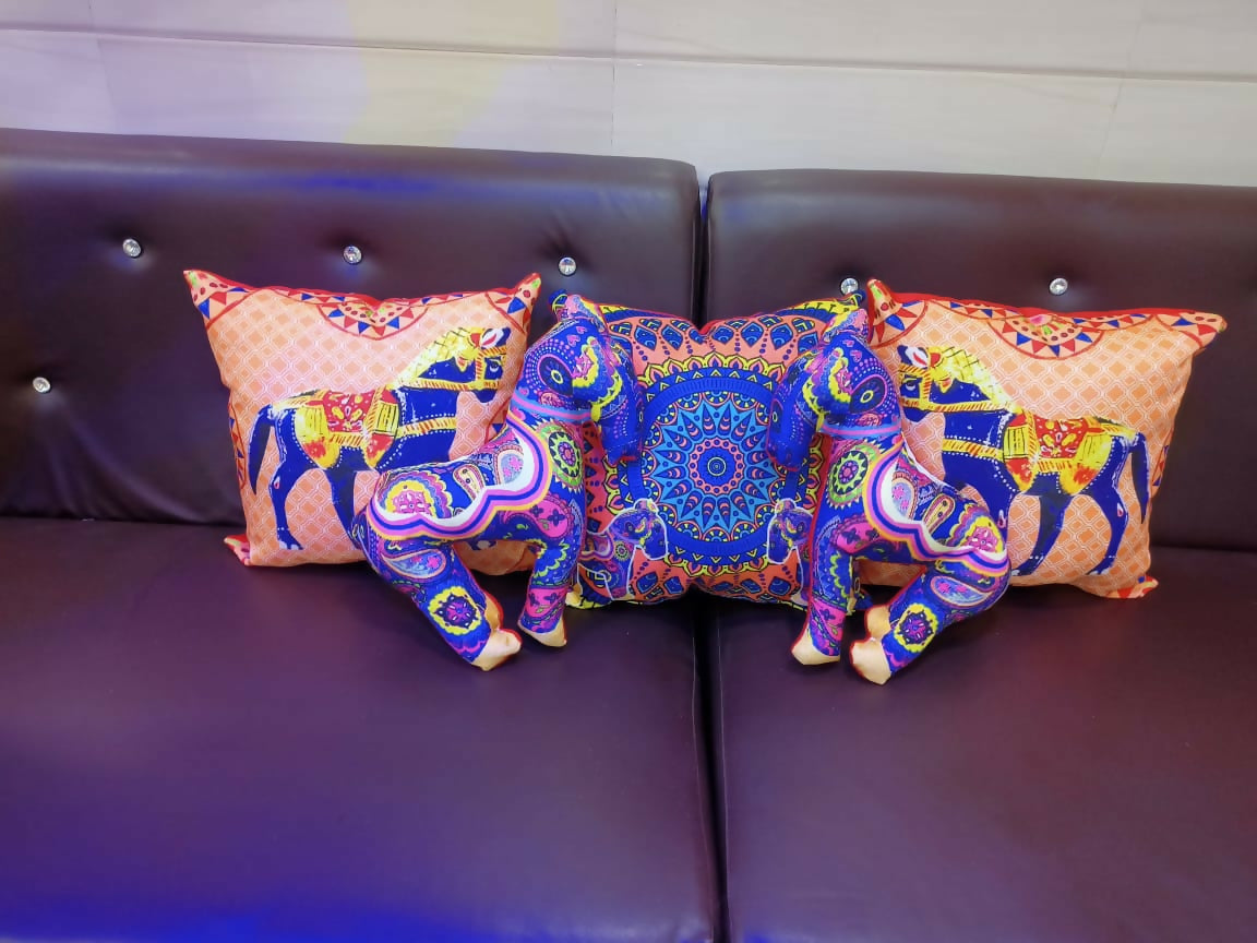 Colorful elephant-patterned cushions