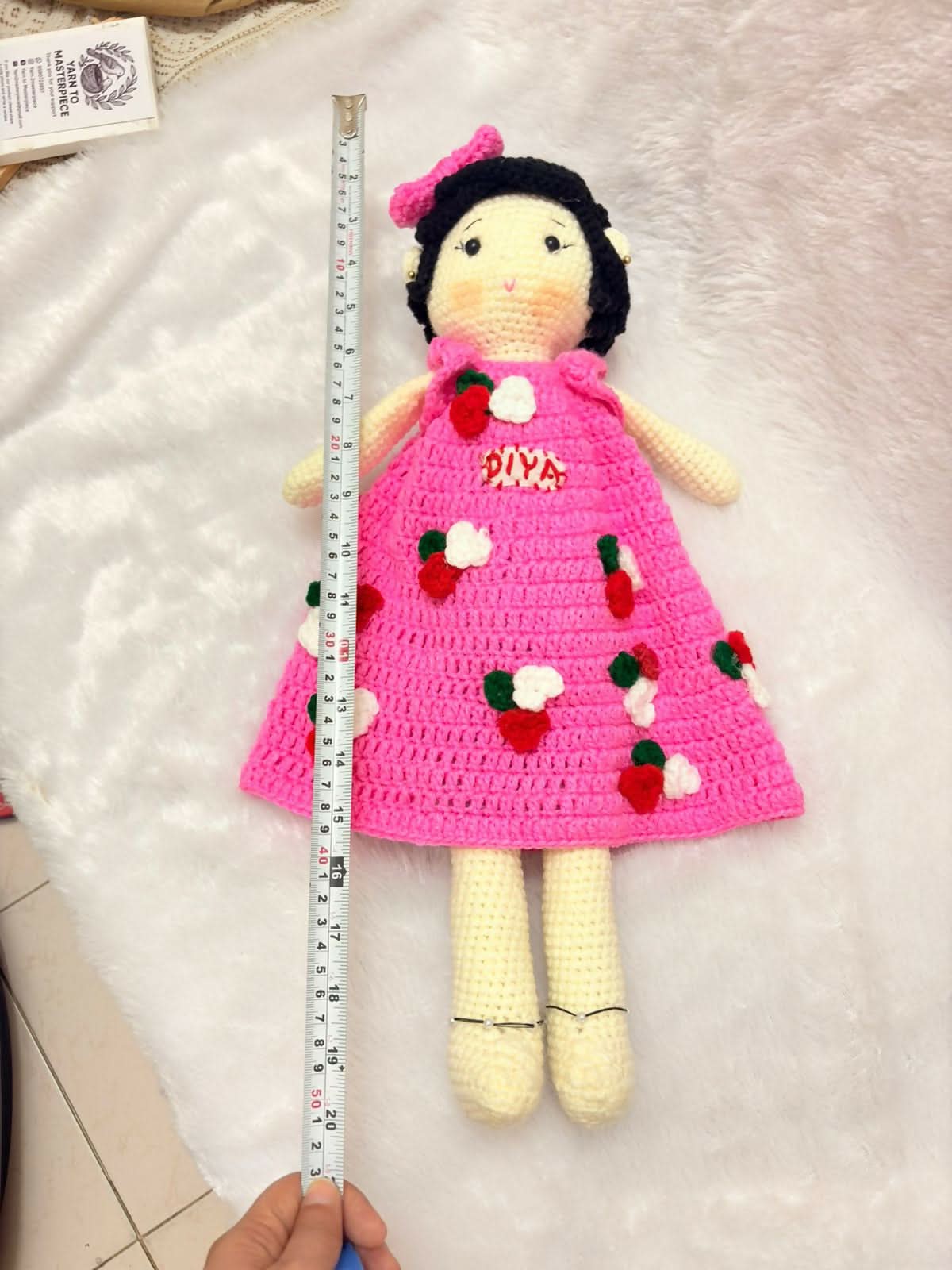 Personalised baby doll with soft hair and custom name embroidery – perfect gift for infants and toddlers.