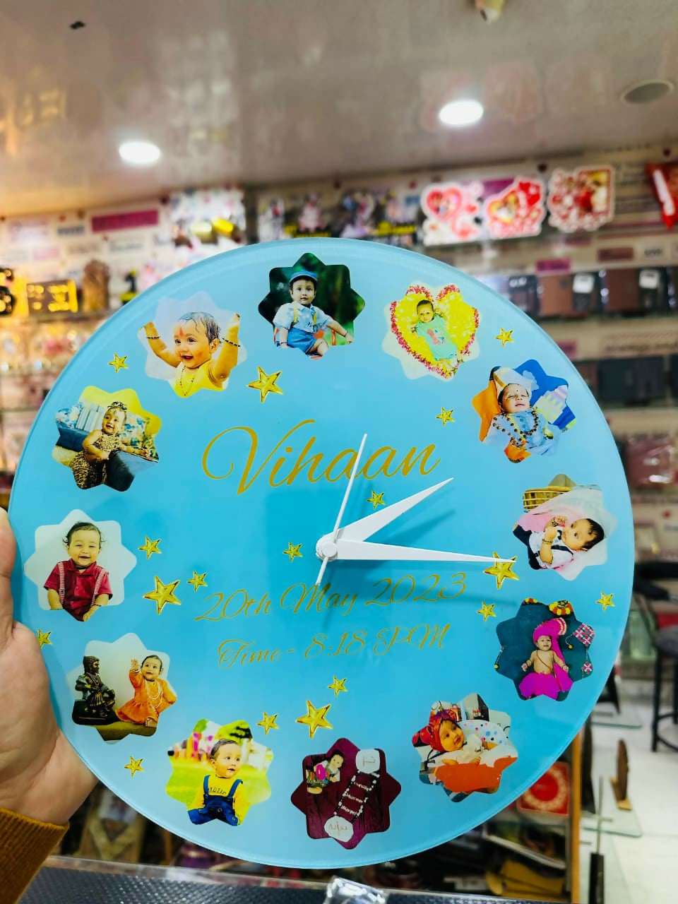 Decorative clock with cartoon characters and text