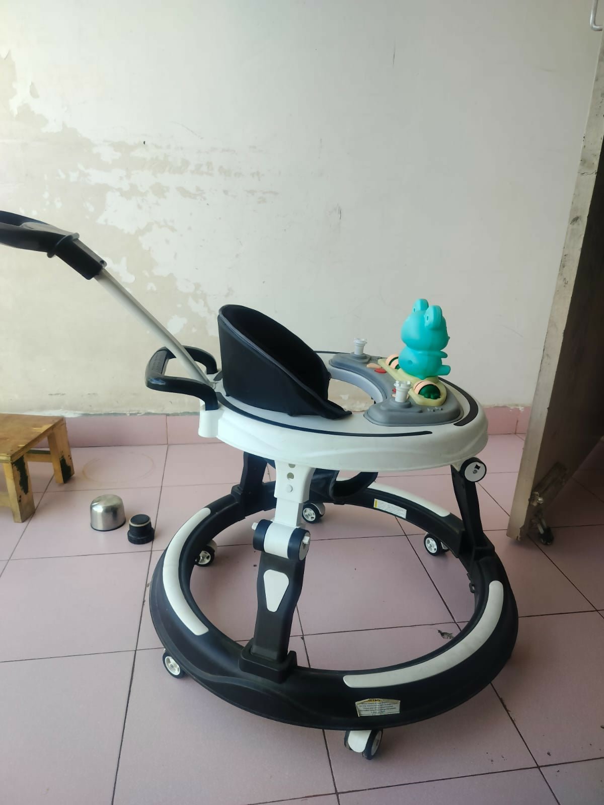 StarAndDaisy 3-in-1 baby walker with parent handle and musical tray, almost new condition