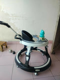 StarAndDaisy 3-in-1 baby walker with parent handle and musical tray, almost new condition