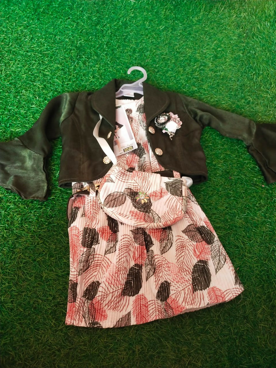 Complete your child's wardrobe with this One Piece Dress set – including coordinating leggings and a matching purse for a stylish and comfortable look, perfect for any occasion.