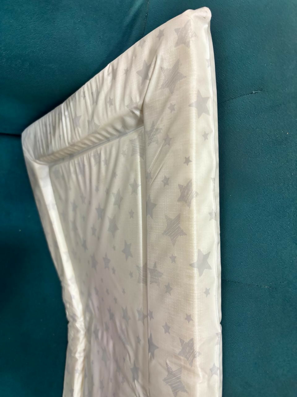 MOTHERCARE padded waterproof changing mat with grey stars – soft, comfy, and easy to clean.