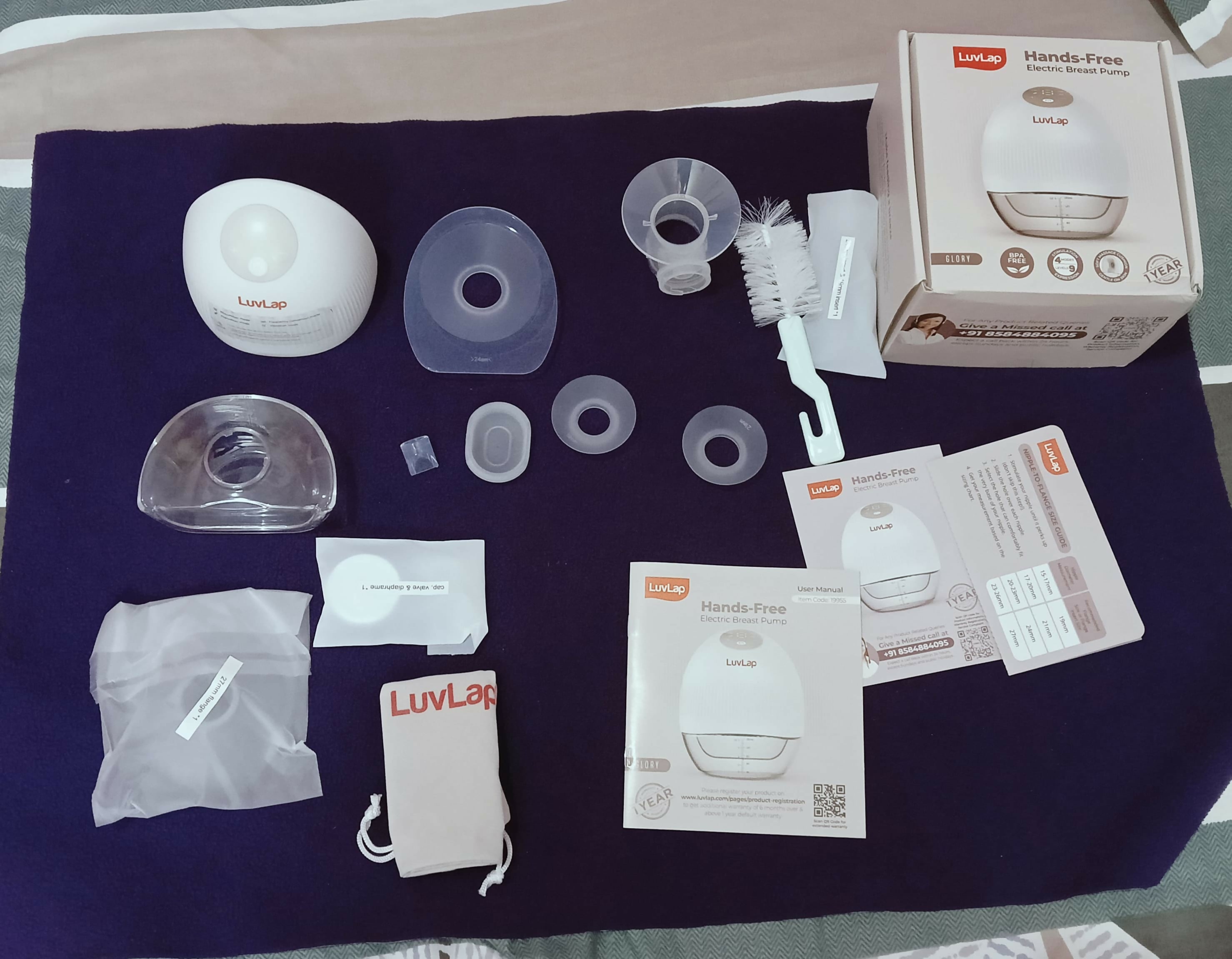 LuvLap baby product set with packaging on a purple blanket