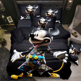 Mickey Mouse-themed bedding set with decorative pillows on a bed.