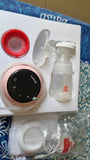Electric breast pump with accessories