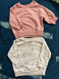 Set of 2 baby sweatshirts (H&M & Lullaby Baby) – warm, soft, and stylish for 0–5 months.