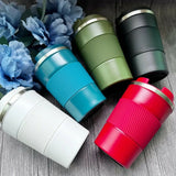Set of colorful travel mugs