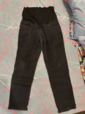 Black pants on a gray surface with red lines
