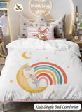 Children's single bed comforter with unicorn and rainbow design on a bed