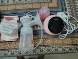 Pink breast pump