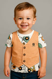 Child wearing a patterned shirt with a vest