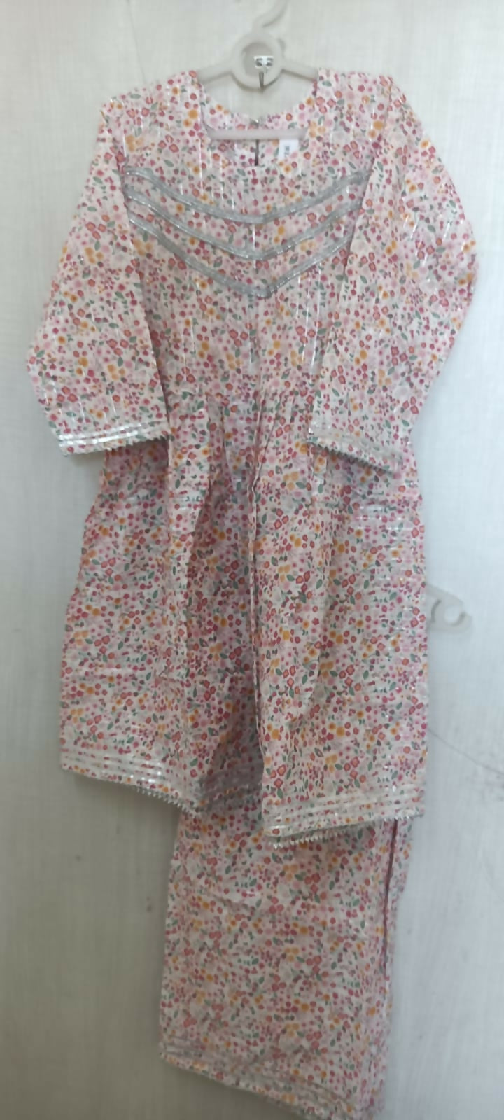 Make a statement with our Beautiful Floral Print Peplum Top and Garara Set, featuring intricate floral prints and luxurious fabric for a look that's both elegant and on-trend.