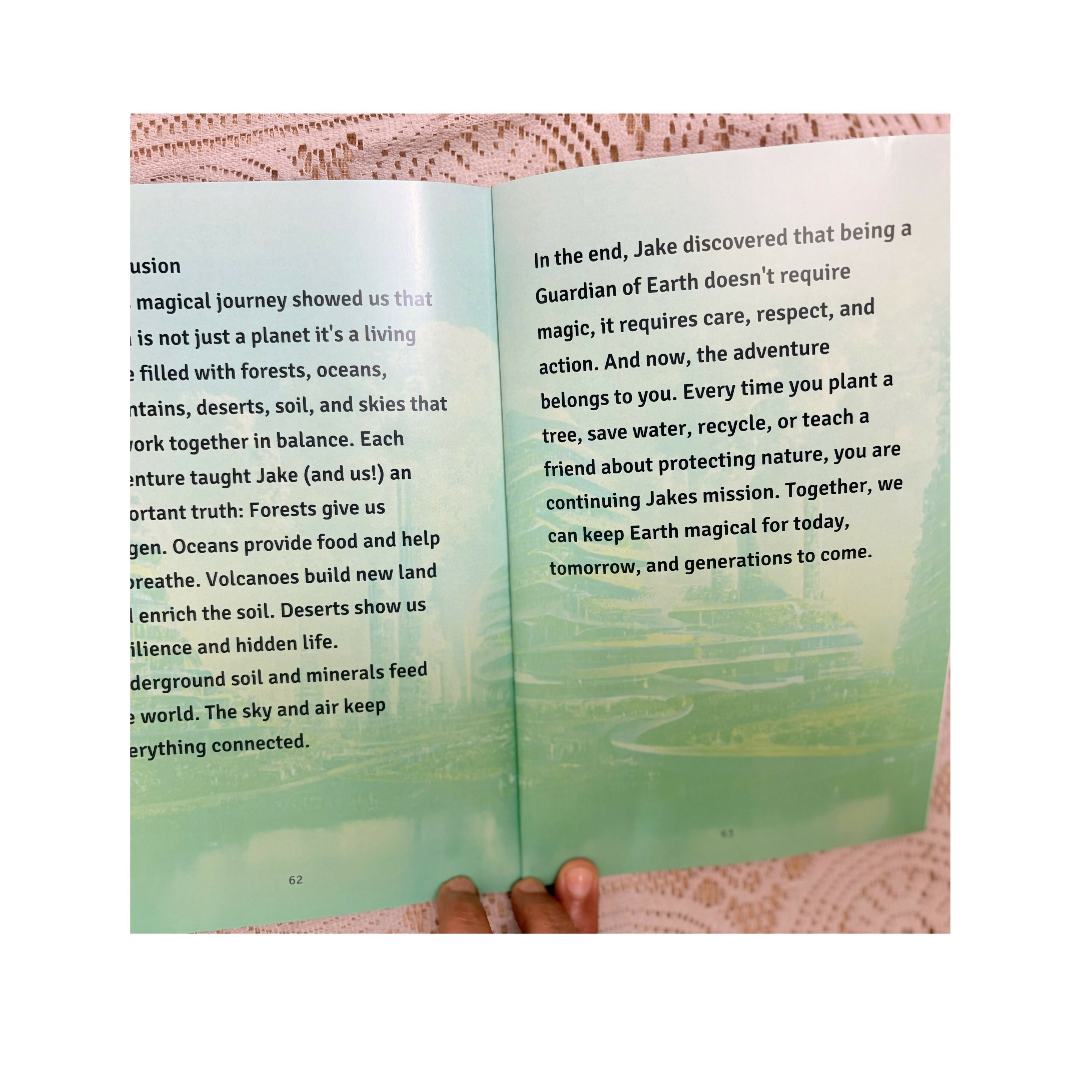 Open book with text on a pink textured background