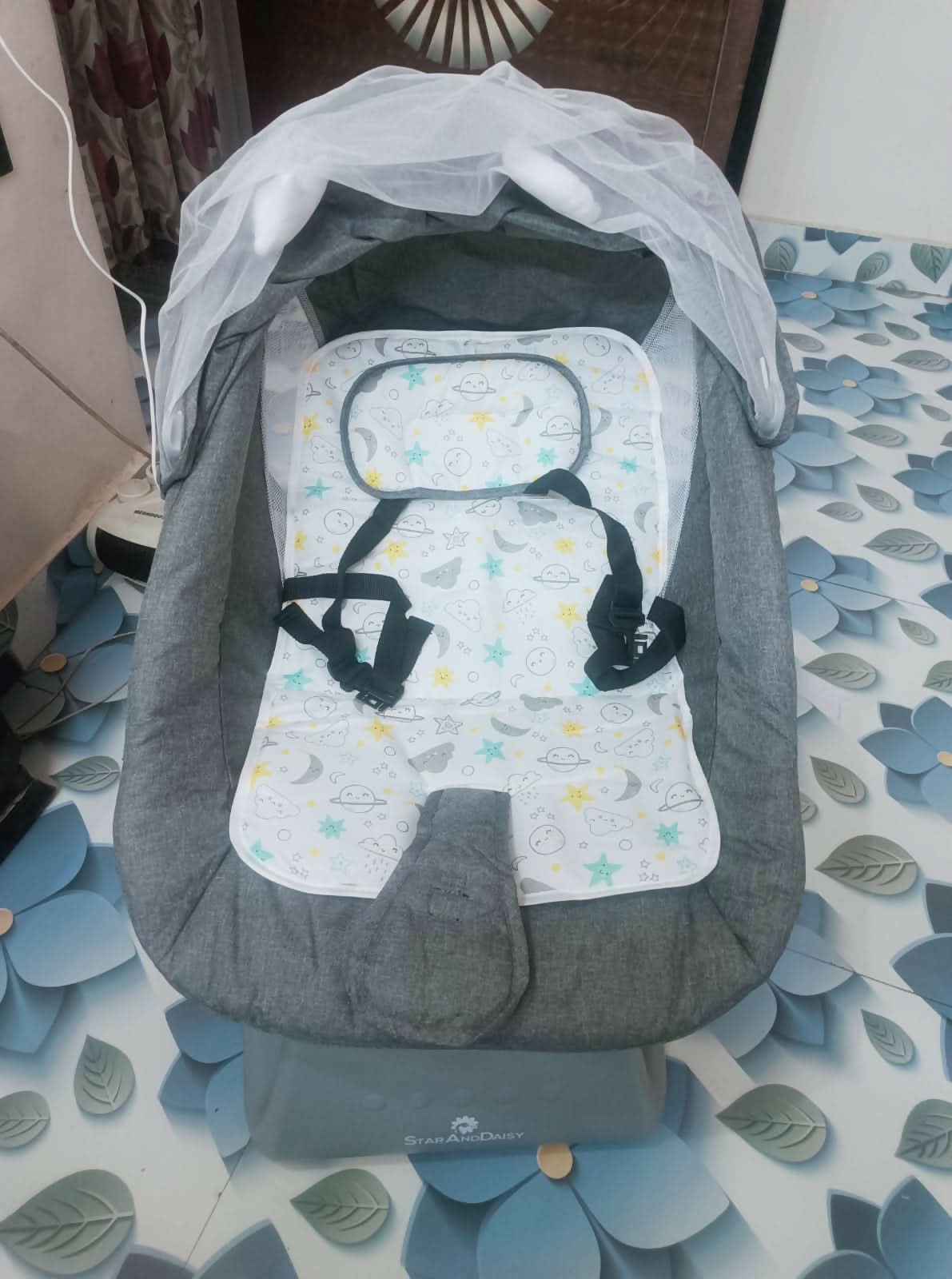 The Star & Daisy Electric Baby Swing is designed to provide a soothing and comfortable experience for your baby.