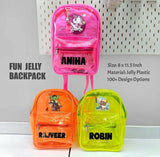 Three colorful jelly backpacks with names printed on them against a white background.